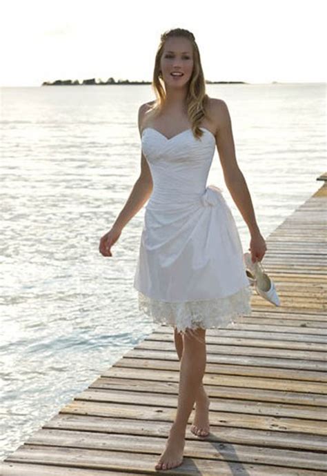 Not only will the cut keep you cool if your beach wedding falls on a hot day, but it also looks sensational. LOVELY SHORT DRESSES FOR THE BRIDE'S COMFORT - Godfather Style