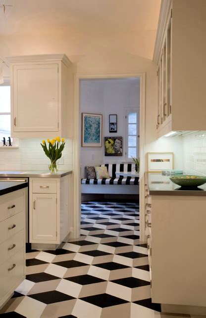 A black and white art piece hangs on the immaculate white wall. Geometric Floor - Modern - Kitchen - los angeles - by ...