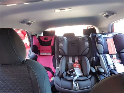 How To Fit Three Car Seats Across Your Back Seat Parenting Central