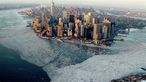 A Stunning Aerial Photo Of Manhattan Island Surrounded By The Frozen