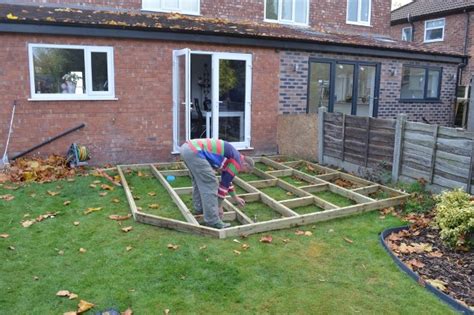 Decking can be used to zone an area that's purely for outdoor dining, or you could create a design feature when you plan your small garden layout by only decking certain areas of the space. Garden Update: DIY Timber Decking - WELL I GUESS THIS IS ...