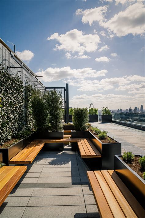 Think oxford street and chances are you aren't going to think of a british garden. Post Building Project | Rooftop terrace design, Roof ...