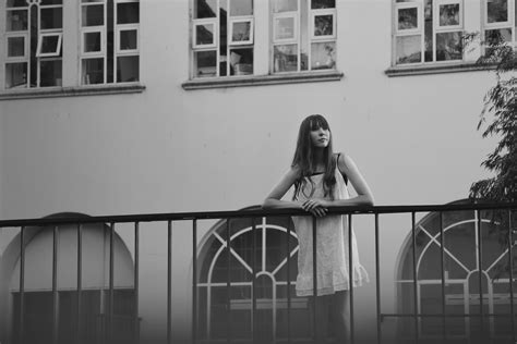 L O N G I N G Girl On Balcony Black And White In Black And White