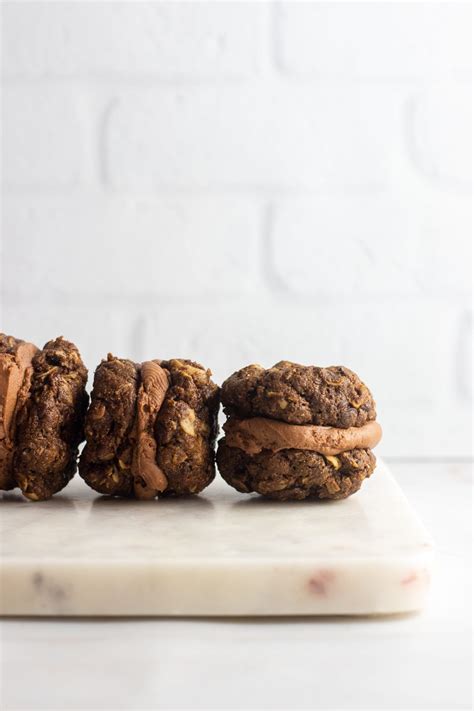Sift icing sugar over the cookies with the holes. Chocolate Almond Sandwich Cookies in 2020 | Chocolate almonds, Sandwich cookies, Free desserts