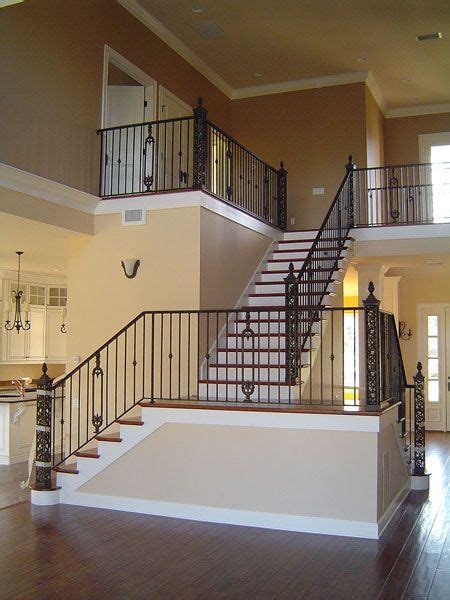 White polycomposite rail kit with black metal balusters. Interior Stair And Balcony Railing With Custom Posts ...