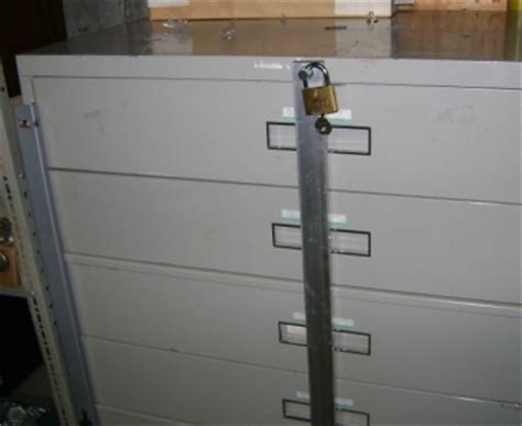 Just close the locking mechanism and lock the bar with a padlock (not included). Outside Bar Locks for filing cabinets