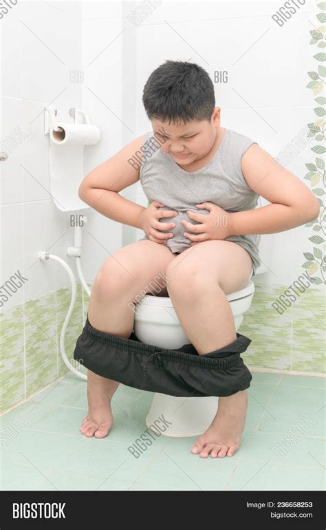 Boy Suffer Stomach Sit Image Photo Free Trial Bigstock