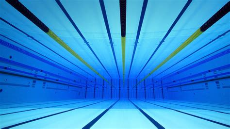 The events and swimmers are as follows: 47+ Olympic Swimming Pool Wallpaper on WallpaperSafari