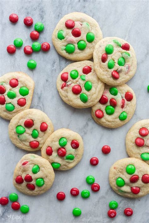 The decorations are a black frosting tube with a fine decorating. Christmas M&M Cookies recipe - The Recipe Rebel