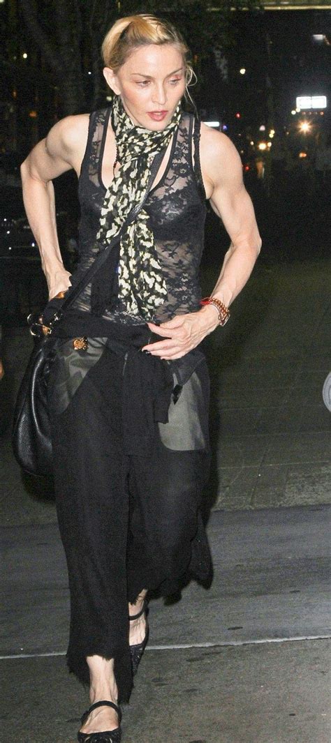 Madonna Shows Off Her Muscular Body In A Sheer Vest While Revealing Her