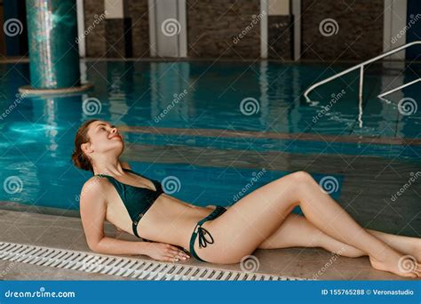 Portrait Of Beautiful In Bikini Woman Relaxing In Swimming Pool Spa In