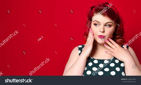 Стоковая фотография 1458134441 closeup pretty fat redhead woman surprise shutterstock