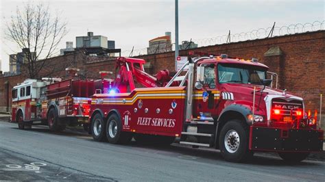 Brand New 2017 Fdny Mack Wrecker Truck Towing Fdny Engine Youtube