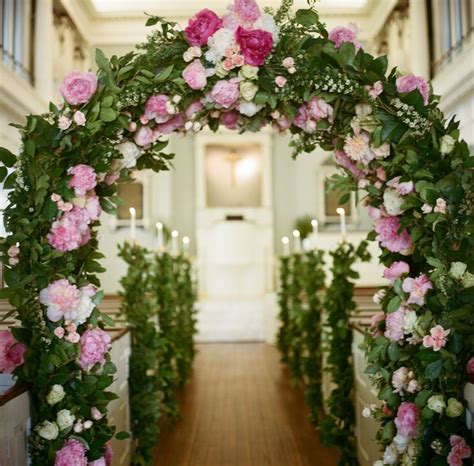 While certain religious customs have design specifications for this ceremony marker, a wedding arch can consist of flowers, branches, wooden structures. Colorful pink church wedding decor with arch | Wedding ...