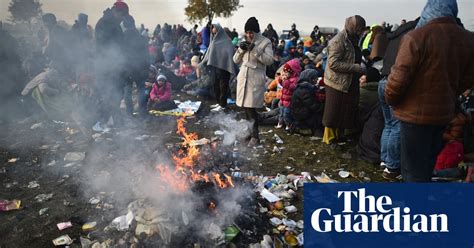 Police Escort Refugees Through Slovenia In Pictures World News The Guardian