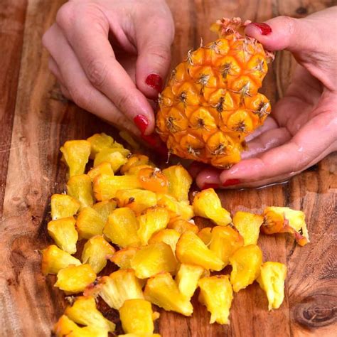 How To Cut A Pineapple Pull Apart Peeling Pineapple Hack Alphafoodie