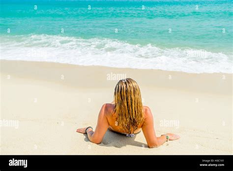 Woman Suntanning On The Beach On The Beach Stock Photo Alamy