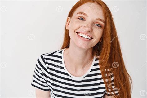 Headshot Portrait Of Happy Ginger Girl With Freckles Smiling Looking At