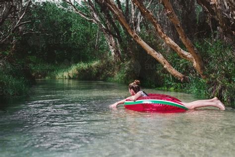 Image Of Teens Floating Down Eli Creek Fraser Island Austockphoto