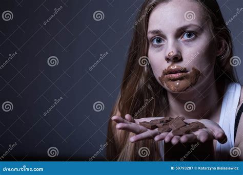Skinny Girl Refusing To Eat Sweets Stock Image 45108685