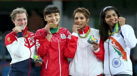 Heres Why Olympians Bite Their Medals When Clicking Pictures