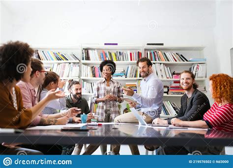 Cheerful Coworkers In Office During Company Meeting Stock Photo Image