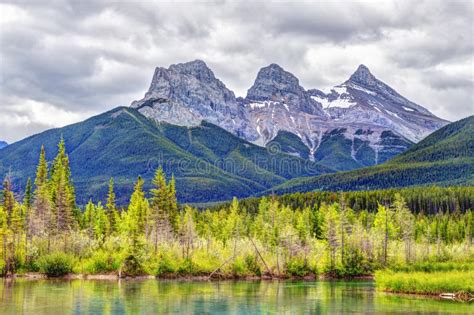 Three Sisters Mountain Peaks In The Canadian Rockies Of Canmore