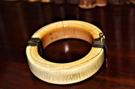 An African Antique Ivory Bracelet With White Metal Mounts In Antique