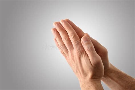 Hands With Palms Together Praying Action With Isolated Gray Background