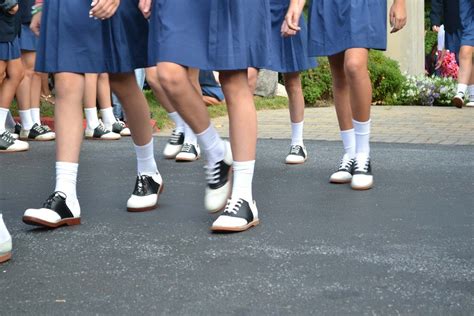 Notre Dame HS Uniforms | School girl dress, Saddle shoes, Cheer skirts