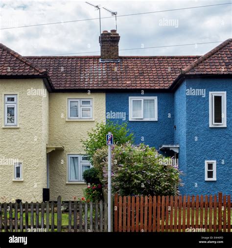 Same But Different Semi Detached Pebble Dash Houses With Yellow And