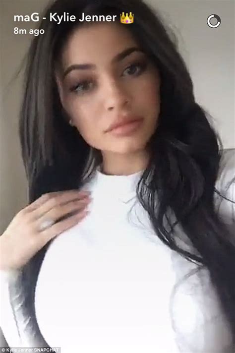 Kylie Jenner Shows Off Sculpted Midsection In Crop Top And Adidas Track