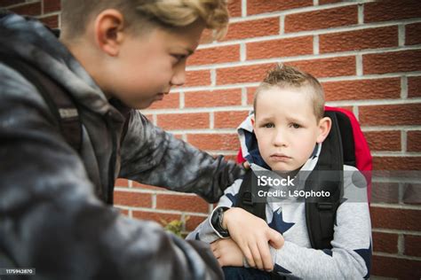Boy Problem At School Sitting And Consoling Child Each Other Stock