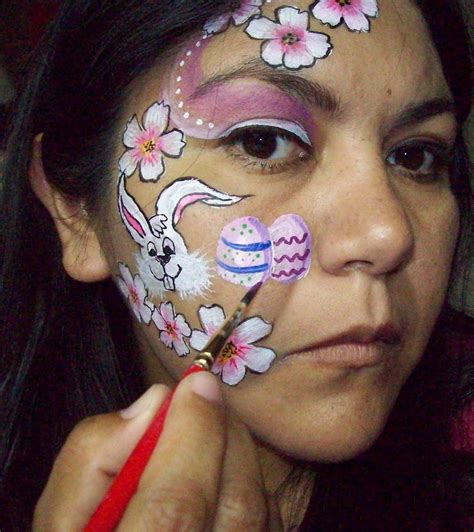 Start off by wetting your brush and getting some pink on it. Easter step by step face painting | Face painting, Face ...