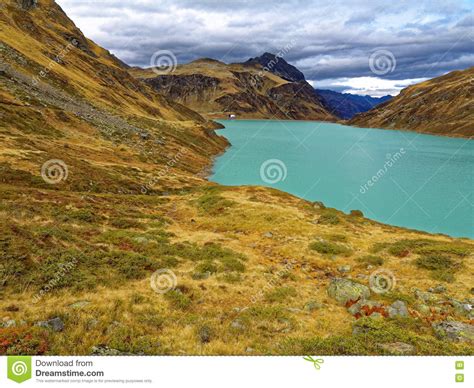 High Alpine Mountain Lake Landscape In Autumnal Light Stock Image
