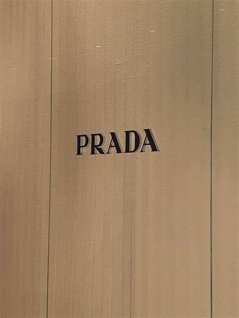 The Word Prada Written In Black On A Wall