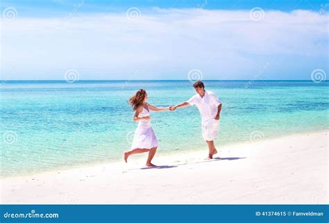 Young Couple Dancing On Beach Of Tropical Island Stock Photo Image