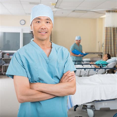 Male Nurse Standing In Hospital Ward Stock Photo Image Of Portrait