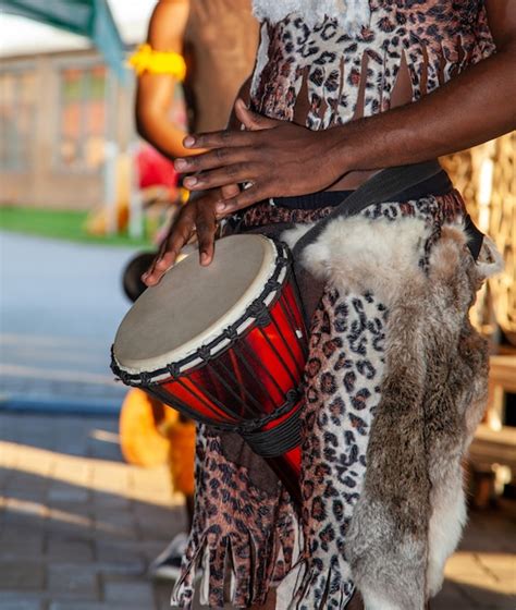 Premium Photo An African Drummer Plays The Djembe