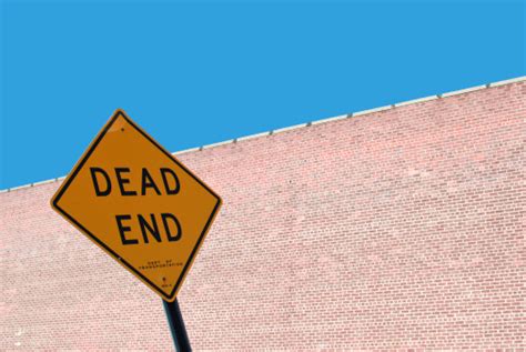 Dead End Sign Stock Photo Download Image Now Blue Brick Wall
