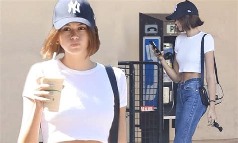 Kaia Gerber Slips Back Into Her Casual Crop Top And Jeans As She Returns Home To Malibu Daily