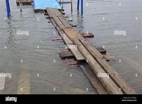 Floating Plank Boards Bridge Over Water Floods Stock Photo Alamy