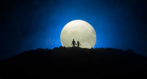 Amazing Love Scene Silhouettes Of Young Romantic Couple Standing Under
