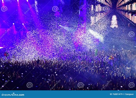 Confetti Over Partying Crowd During A Live Concert Editorial Stock