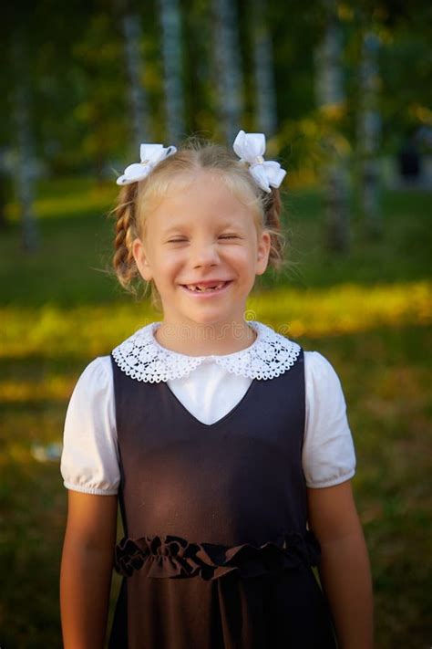 Little Girl Of Elementary School Student In Modern School Uniform