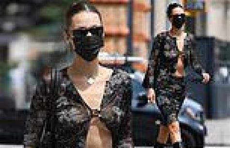 bella hadid flashes more than just midriff as she goes braless in a mesh set