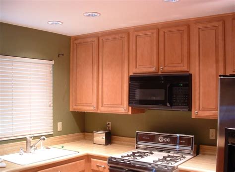 A soffit is the horizontal surface under a roof overhang. 4 Ways to Fix Kitchen Cabinet Open Soffits (With images ...