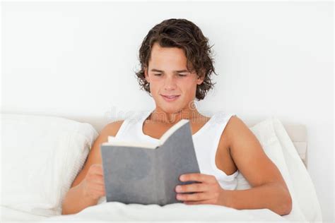 Handsome Man Reading A Book Stock Photos Image
