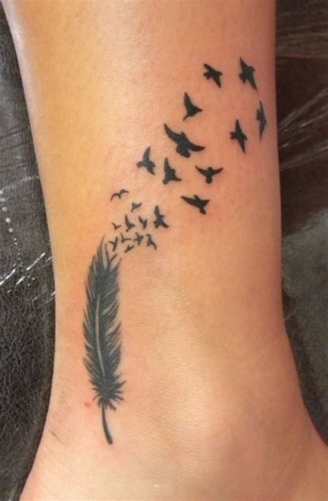 Black Feather Into Birds Tattoo Tattooimages Biz