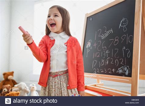 Girl Pretending To Be Teacher Stock Photo Alamy